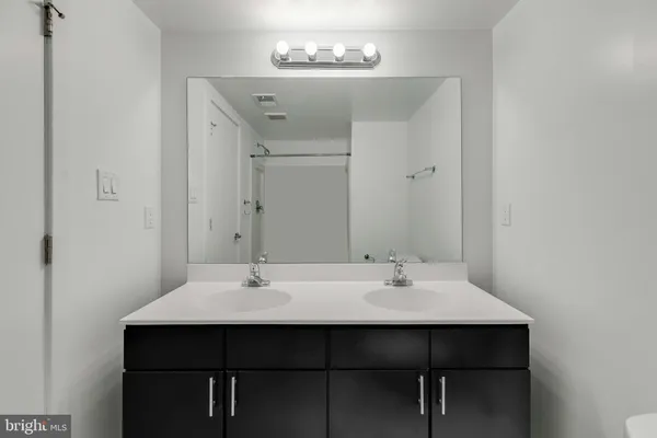 a sink with a mirror
