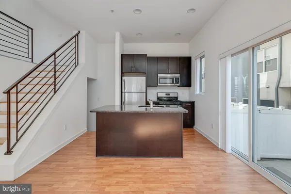 a view of kitchen and microwave