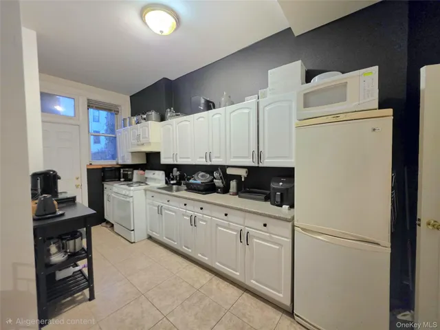 a kitchen with a sink a stove and refrigerator