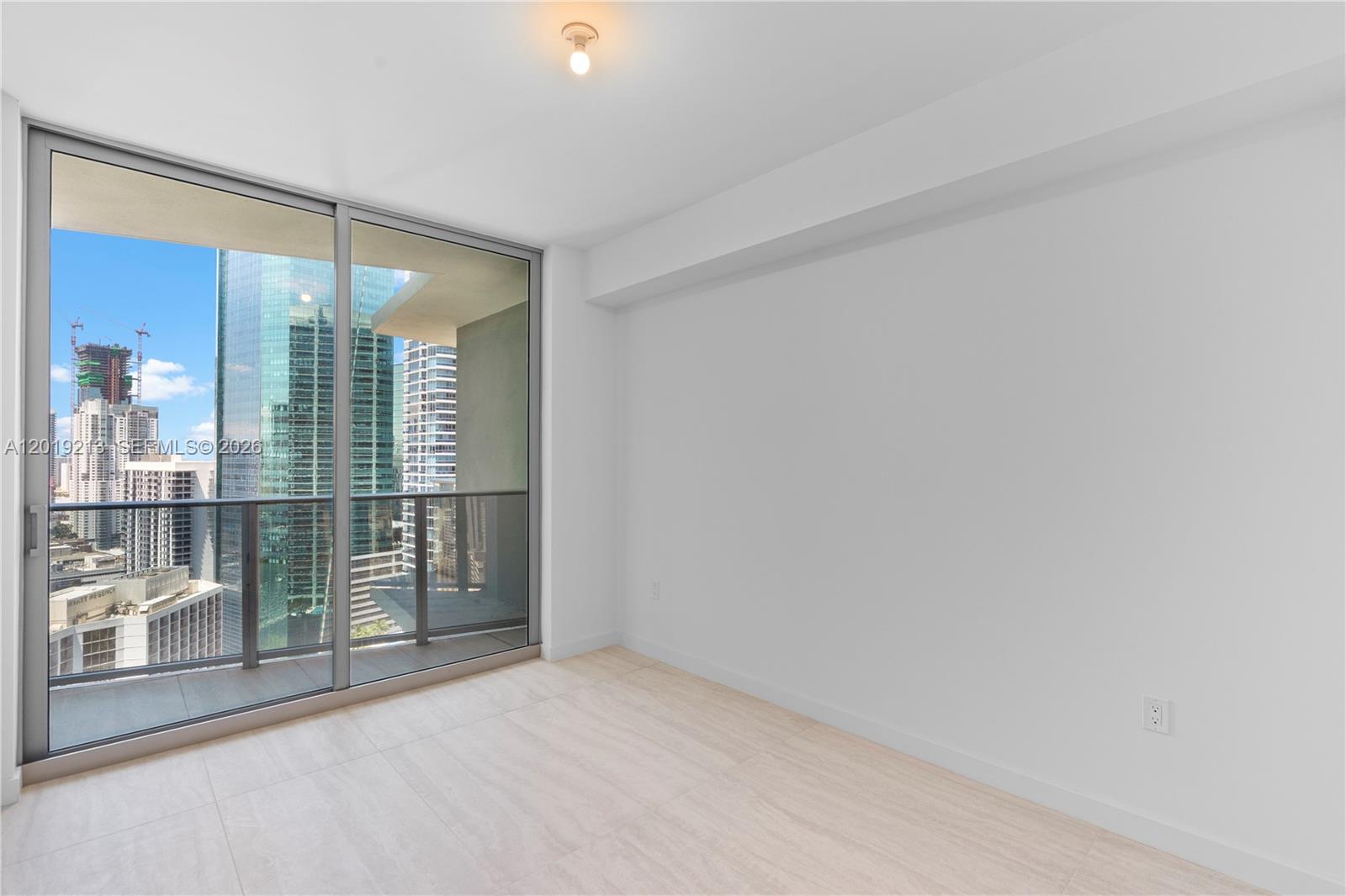 77 Southeast 5th, Unit 3702 Miami, FL 33131 - Photo 25 of 63 a view of a room with window