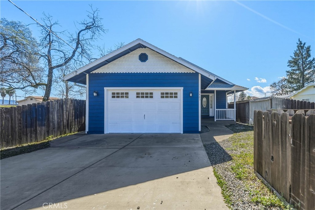 3483 Beach Street Nice, CA 95464 - Photo 1 of 40 a view of a house with a yard