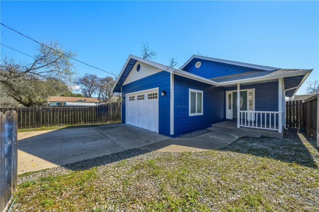 3483 Beach Street Nice, CA 95464 - Photo 2 of 40 a view of a house with wooden fence