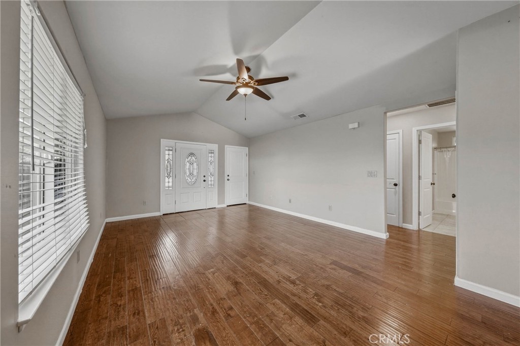 3483 Beach Street Nice, CA 95464 - Photo 3 of 40 wooden floor in an empty room with a window