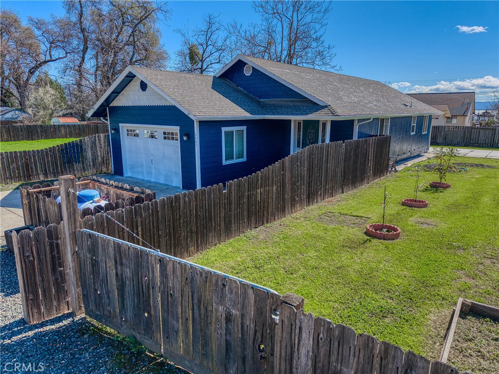 3483 Beach Street Nice, CA 95464 - Photo 35 of 40 a view of a house with wooden fence