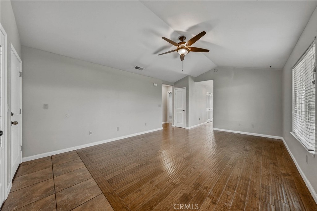 3483 Beach Street Nice, CA 95464 - Photo 4 of 40 wooden floor in an empty room with a window