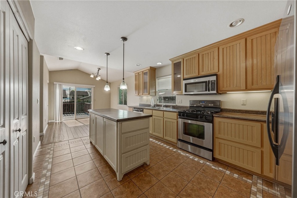 3483 Beach Street Nice, CA 95464 - Photo 7 of 40 a kitchen with a sink stove and oven