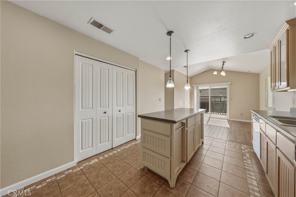 3483 Beach Street Nice, CA 95464 - Photo 10 of 40 a large kitchen with granite countertop a stove and a sink