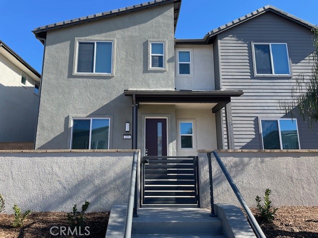 213 Shoveler Irvine, CA 92618 - Photo 1 of 19 a view of a house with a large windows