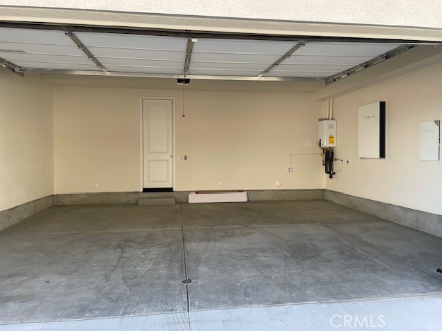 213 Shoveler Irvine, CA 92618 - Photo 18 of 19 a view of a room with rack on the wall