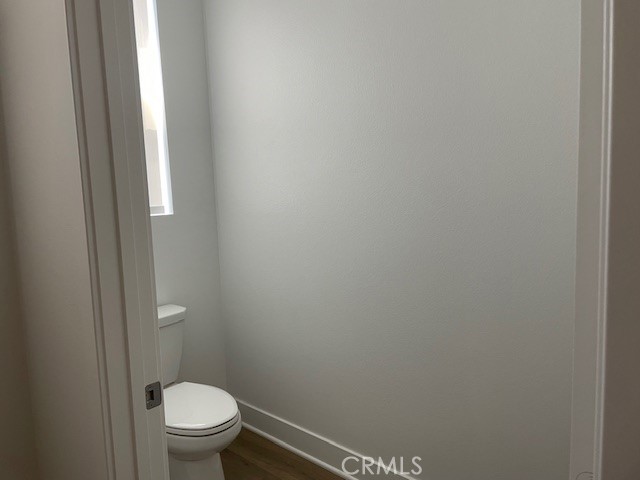 213 Shoveler Irvine, CA 92618 - Photo 7 of 19 a white toilet sitting next to a shower
