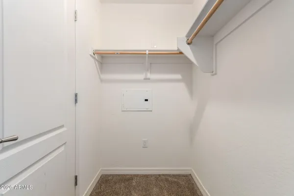 a view of small space with racks on the wall