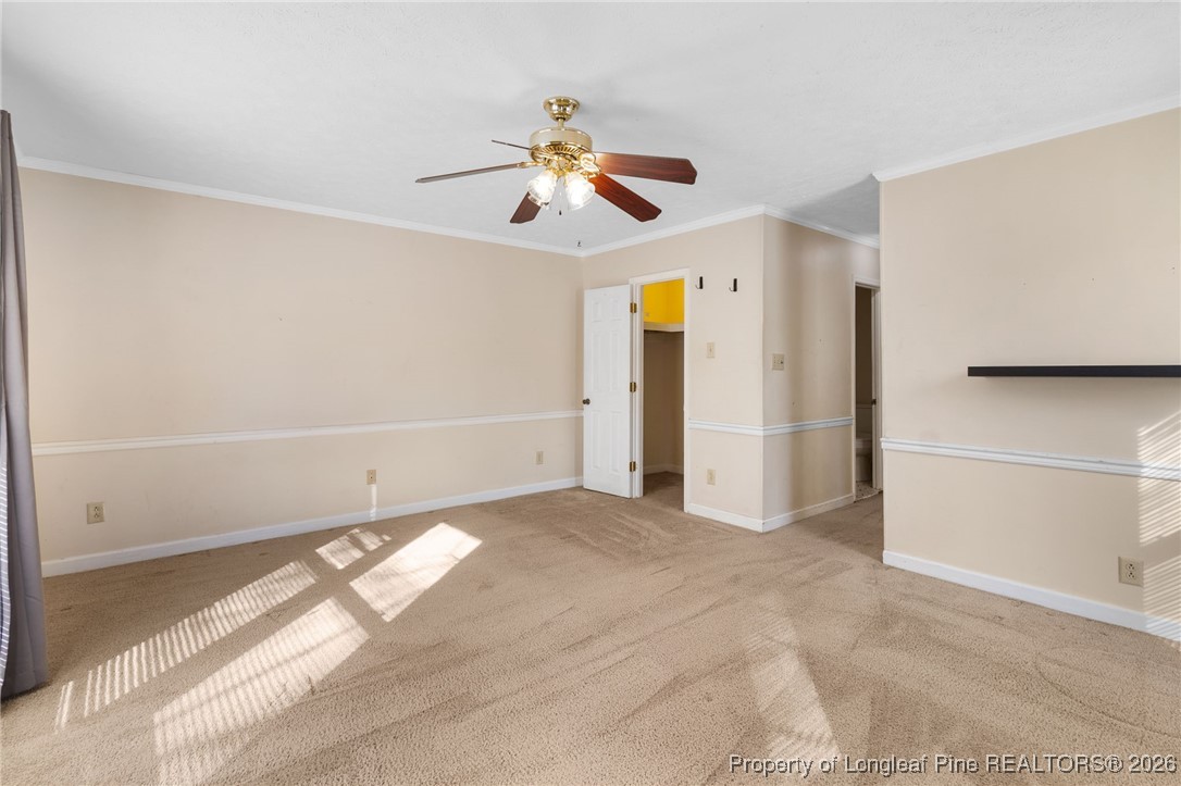 2924 Walden Road Fayetteville, NC 28303 - Photo 21 of 44 a view of a livingroom with a ceiling fan and window