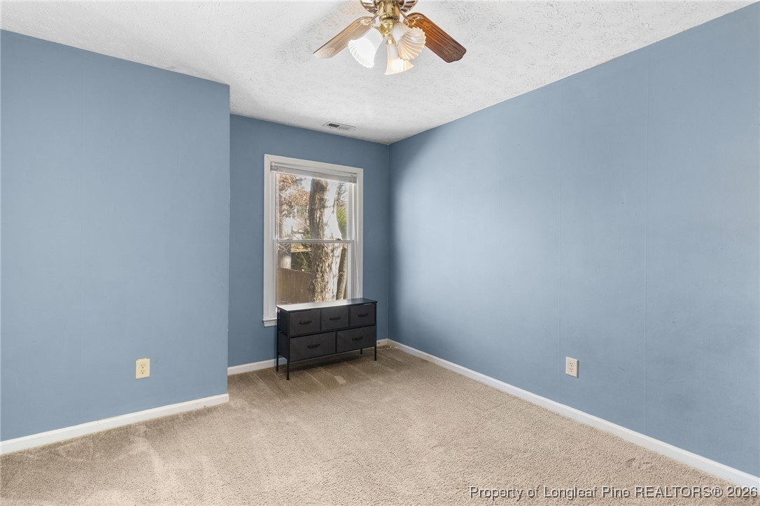 2924 Walden Road Fayetteville, NC 28303 - Photo 32 of 44 a view of an empty room with a window