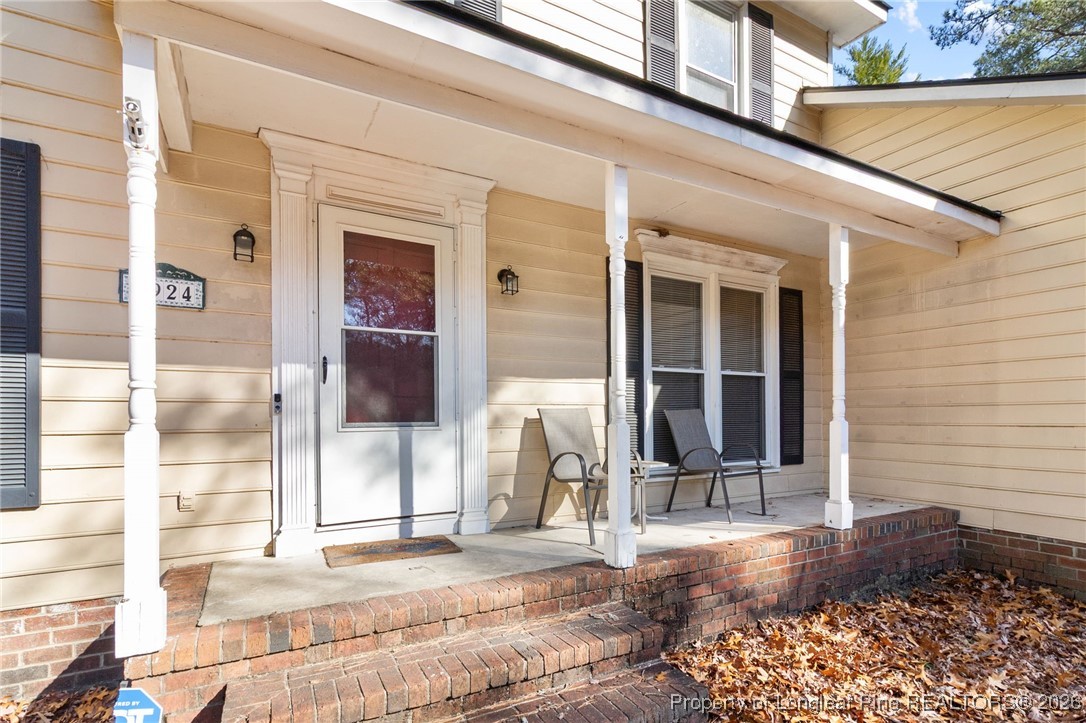 2924 Walden Road Fayetteville, NC 28303 - Photo 4 of 44 a front view of a house with a patio