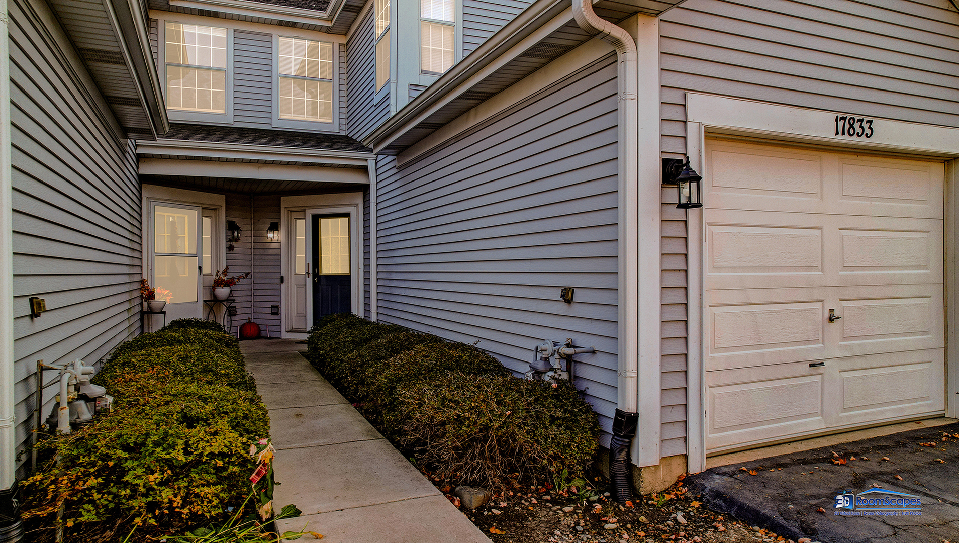 17833 Braewick Road Gurnee, IL 60031 - Photo 4 of 33 a view of a house with a door and wooden floor