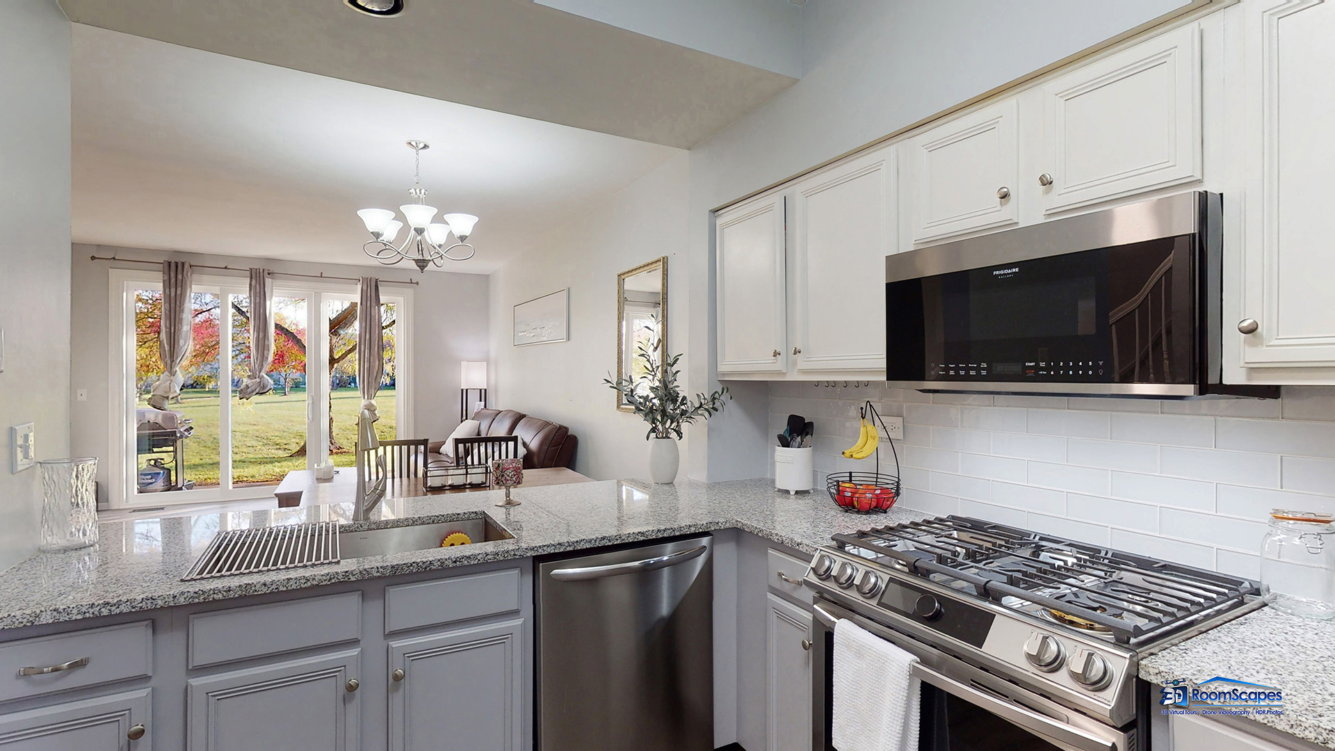 17833 Braewick Road Gurnee, IL 60031 - Photo 6 of 33 a kitchen with stainless steel appliances a sink dishwasher stove microwave and cabinets