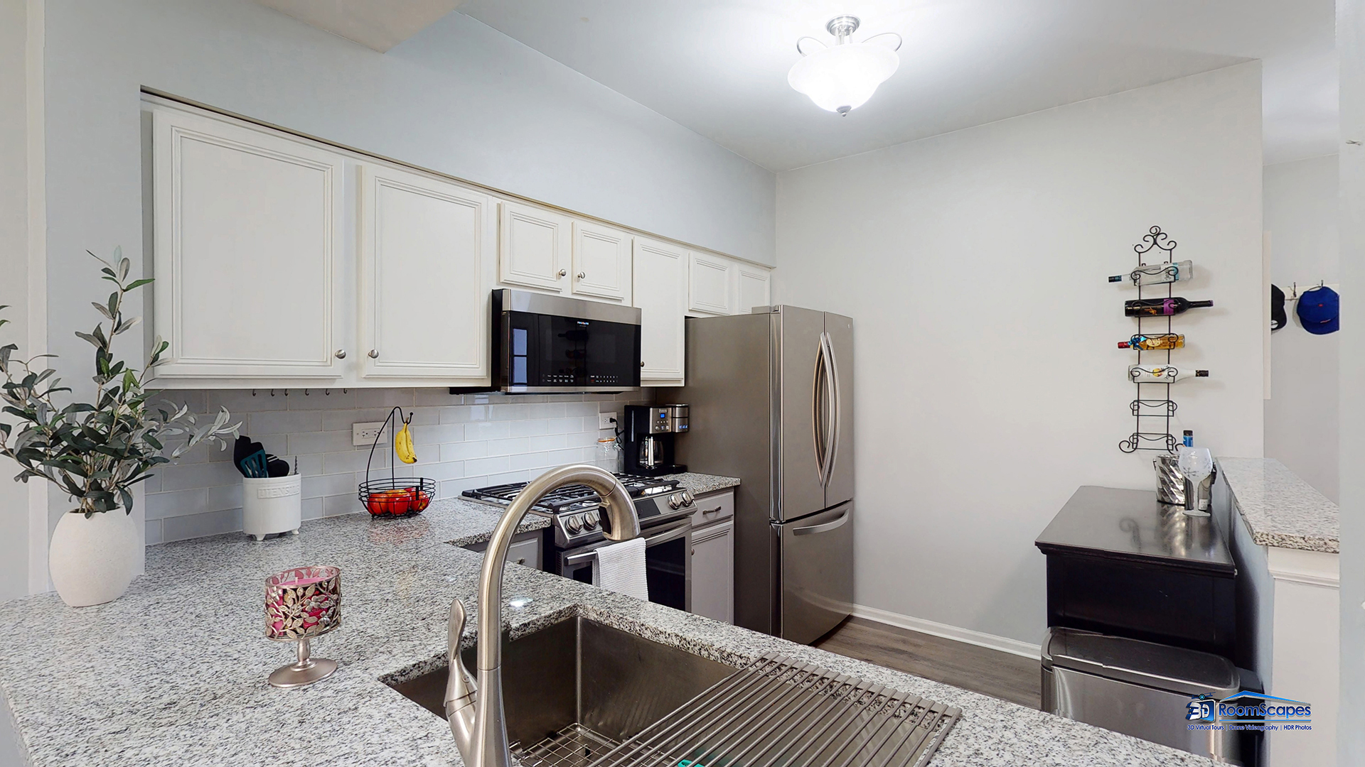 17833 Braewick Road Gurnee, IL 60031 - Photo 8 of 33 a kitchen with stainless steel appliances a sink stove and refrigerator
