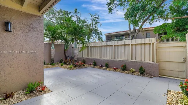 a bedroom with a bed and cabinets