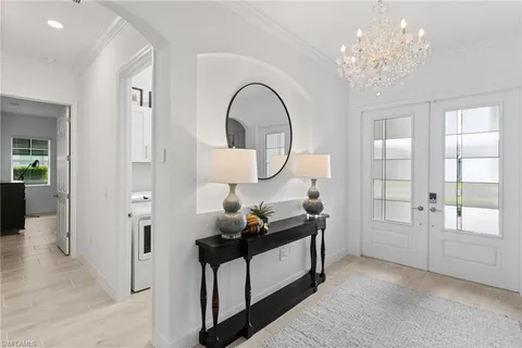 a view of hall way with mirror