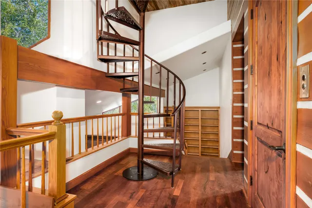 a view of empty room with large windows