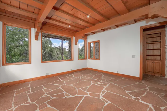 an empty room with windows