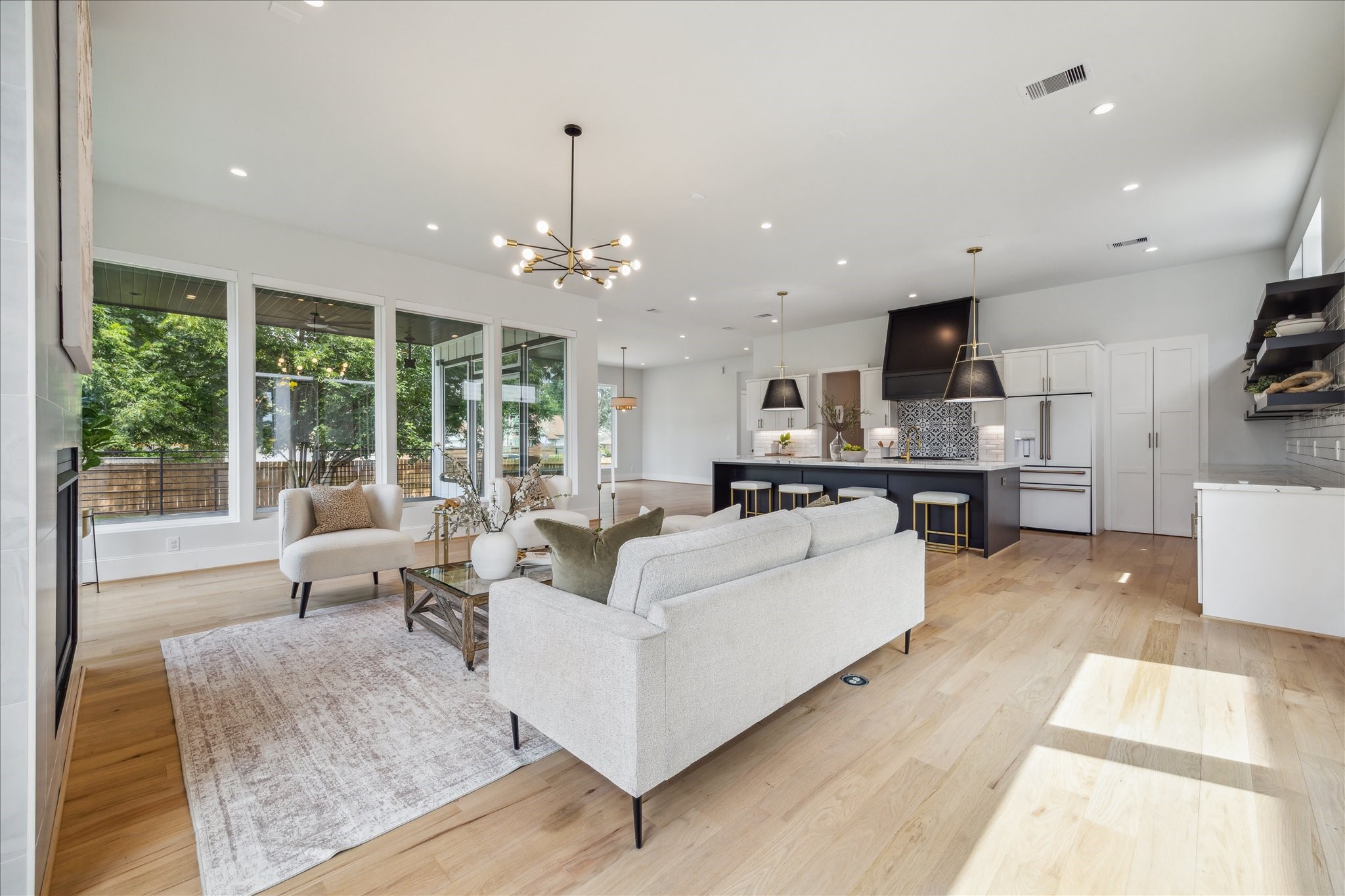 2202 Hewitt Drive Houston, TX 77018 - Photo 14 of 39 Another view of the kitchen and living room. Next to the refrigerator is the camouflaged entrance to the huge pantry—a dream for anyone who loves to cook.