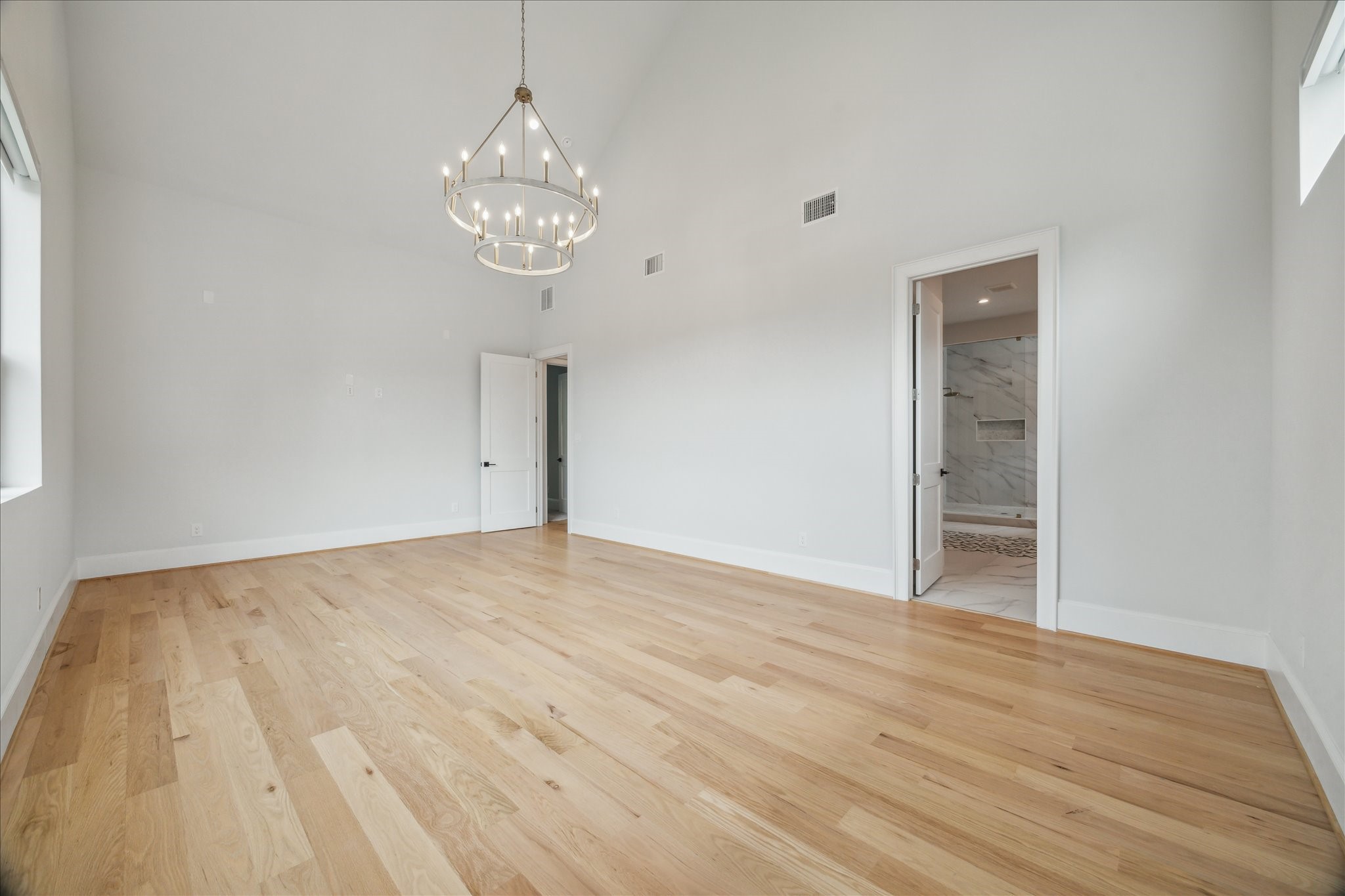 2202 Hewitt Drive Houston, TX 77018 - Photo 22 of 39 Another view of the spacious primary bedroom, offering plenty of room for a seating area.