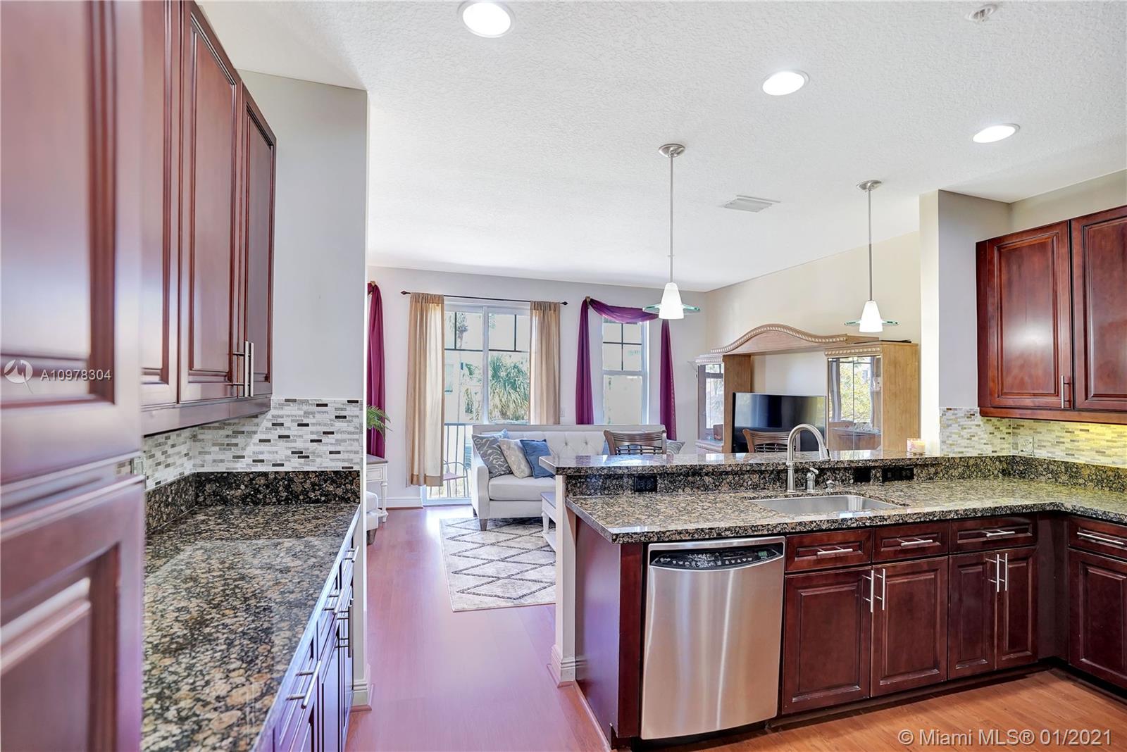 535 Northwest 35th Place Boca Raton, FL 33431 - Photo 15 of 52 KITCHEN AND LIVING ROOM