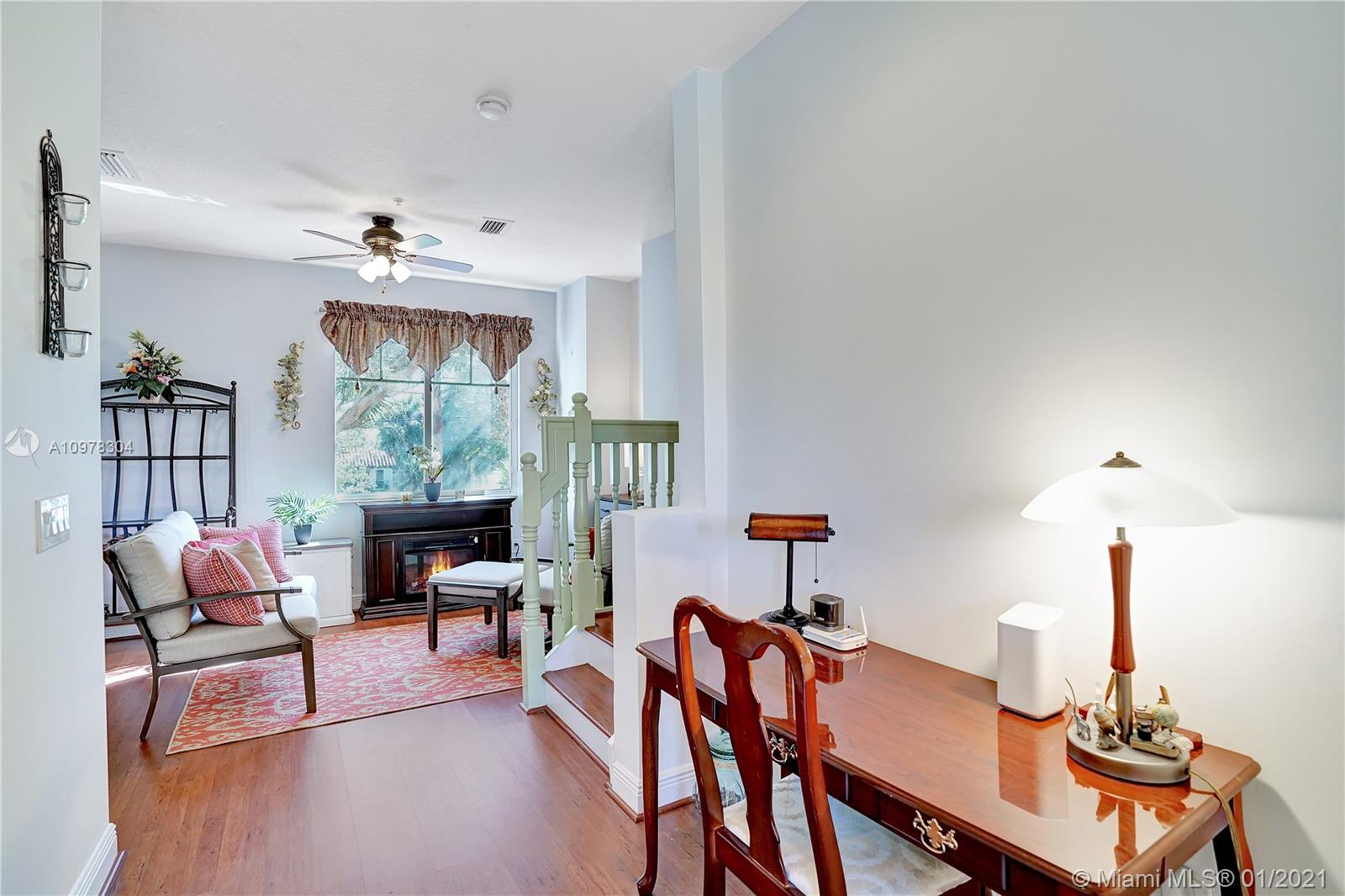 535 Northwest 35th Place Boca Raton, FL 33431 - Photo 23 of 52 HALLWAY AND PART OF THE DINNING ROOM - 2ND FLOOR