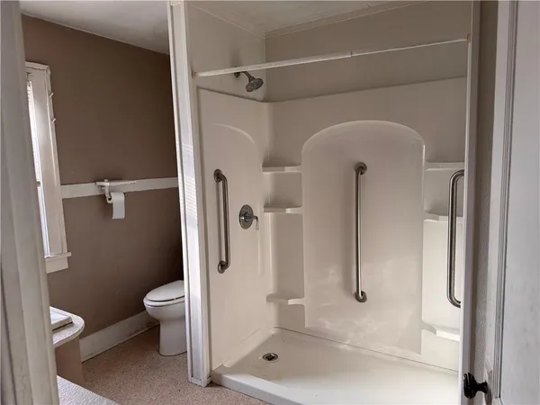 a bathroom with a sink vanity and a mirror