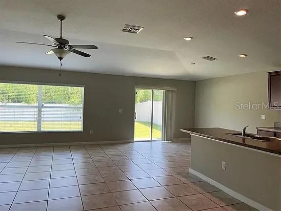 1606 Redmond Brook Lane Ruskin, FL 33570 - Photo 11 of 26 a view of an empty room and window