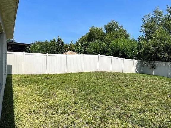 1606 Redmond Brook Lane Ruskin, FL 33570 - Photo 23 of 26 a view of a backyard