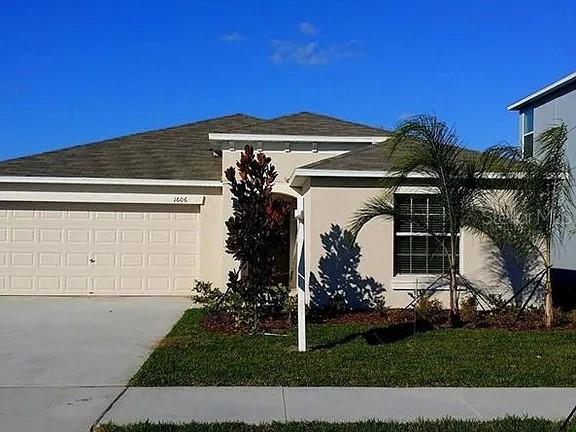 1606 Redmond Brook Lane Ruskin, FL 33570 - Photo 26 of 26 a view of a house with a yard