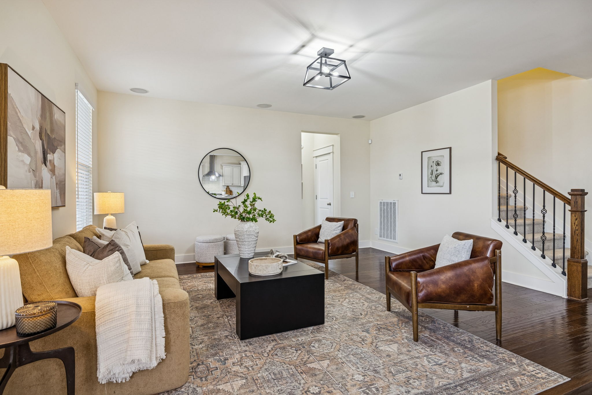 737 Newcomb Street Franklin, TN 37064 - Photo 14 of 99 a living room with furniture a rug and a chandelier
