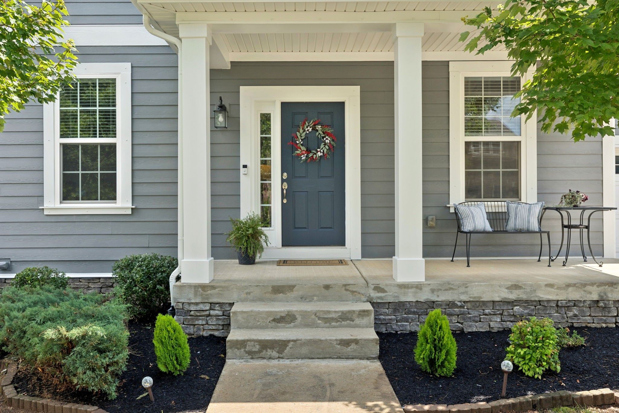737 Newcomb Street Franklin, TN 37064 - Photo 2 of 99 a front view of a house with a garden