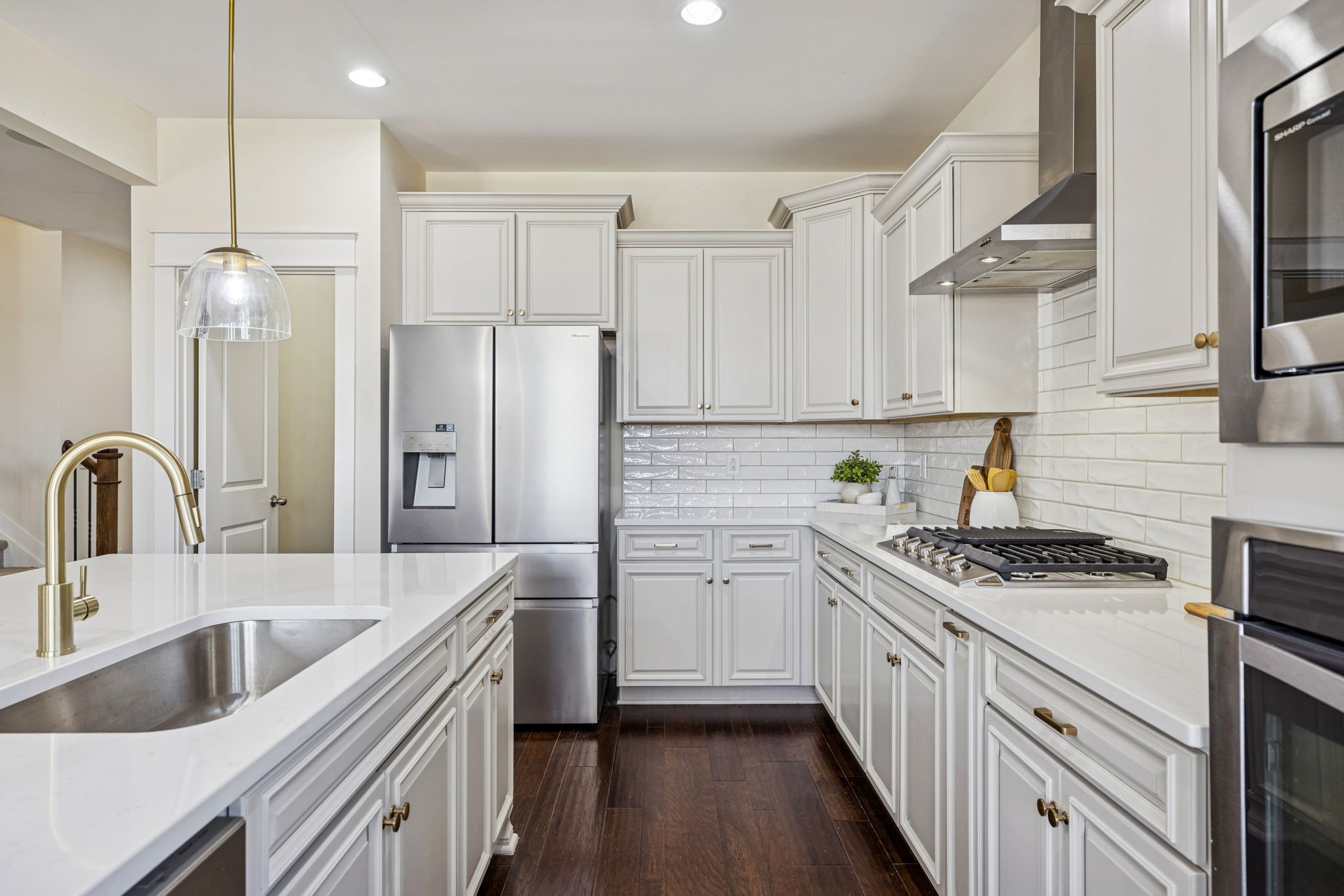 737 Newcomb Street Franklin, TN 37064 - Photo 23 of 99 a kitchen with stainless steel appliances granite countertop a sink stove and refrigerator