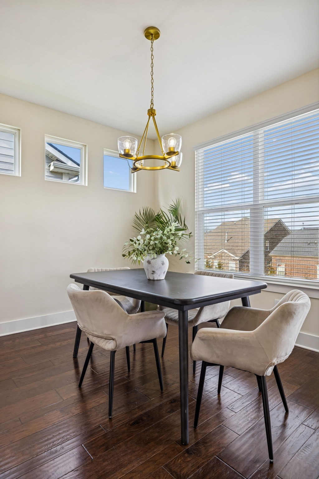 737 Newcomb Street Franklin, TN 37064 - Photo 34 of 99 a view of a dining room with furniture window and wooden floor