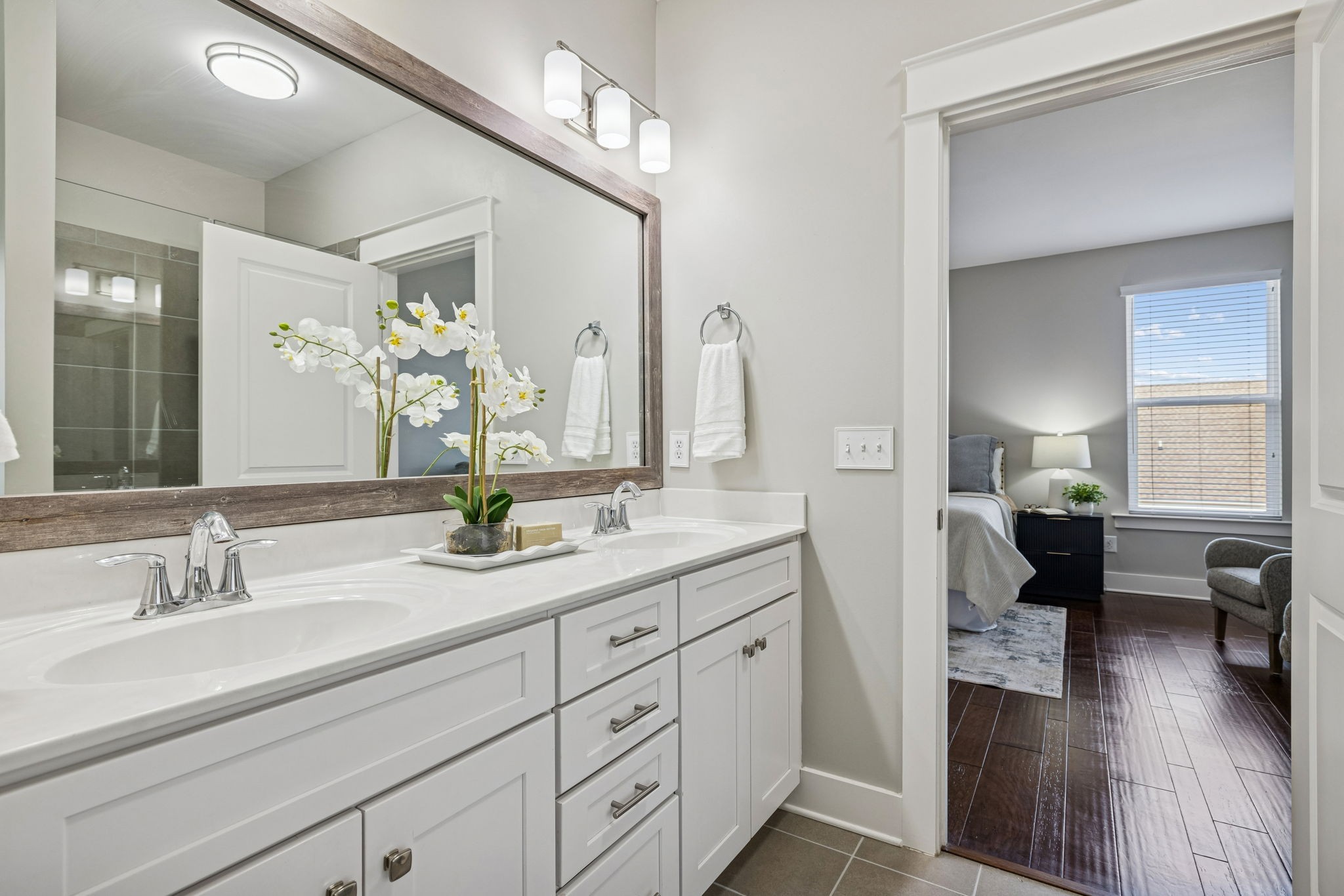 737 Newcomb Street Franklin, TN 37064 - Photo 50 of 99 a en suite bathroom with double sink and a large mirror