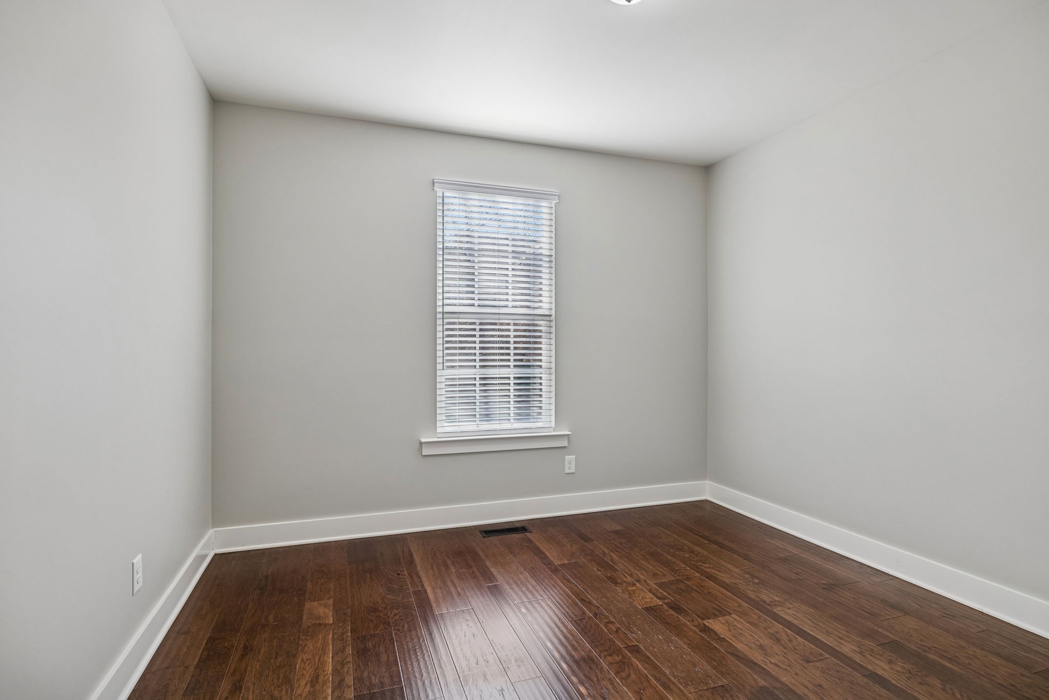 737 Newcomb Street Franklin, TN 37064 - Photo 55 of 99 wooden floor in an empty room with a window