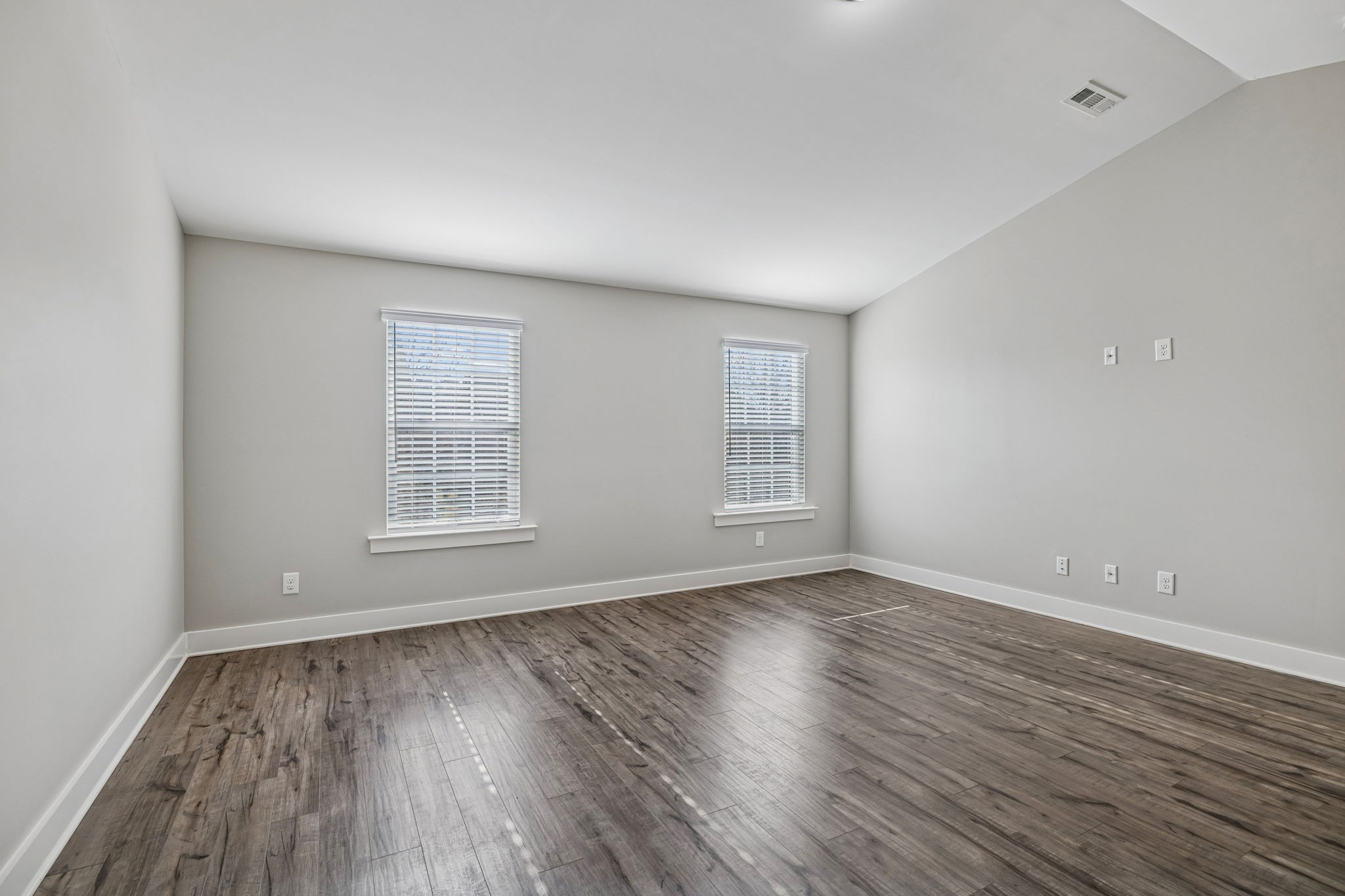 737 Newcomb Street Franklin, TN 37064 - Photo 61 of 99 an empty room with wooden floor and windows