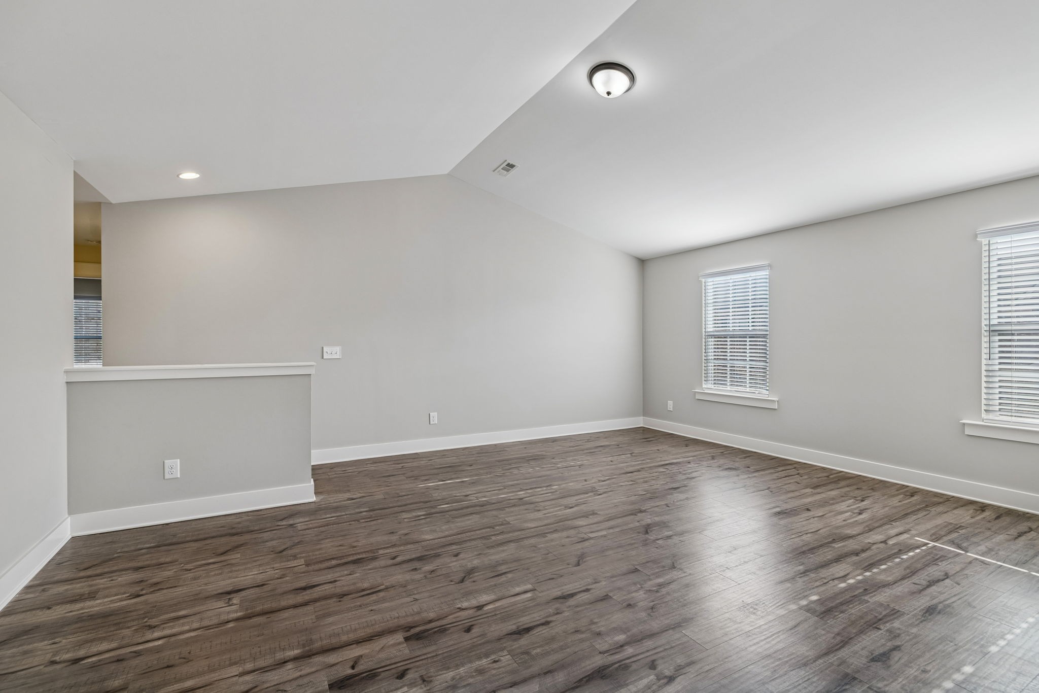 737 Newcomb Street Franklin, TN 37064 - Photo 66 of 99 an empty room with wooden floor and windows