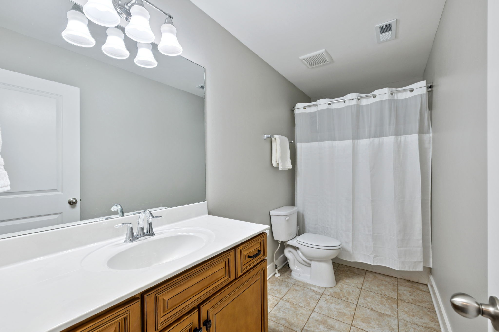 737 Newcomb Street Franklin, TN 37064 - Photo 82 of 99 a bathroom with a sink vanity mirror and toilet