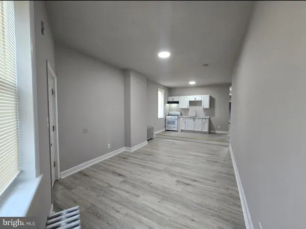 a view of a kitchen and a sink
