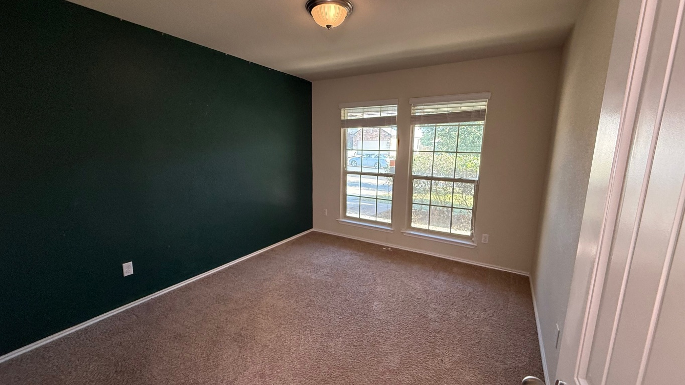 116 Zoisite Lane Jarrell, TX 76537 - Photo 12 of 21 a view of a livingroom with a window