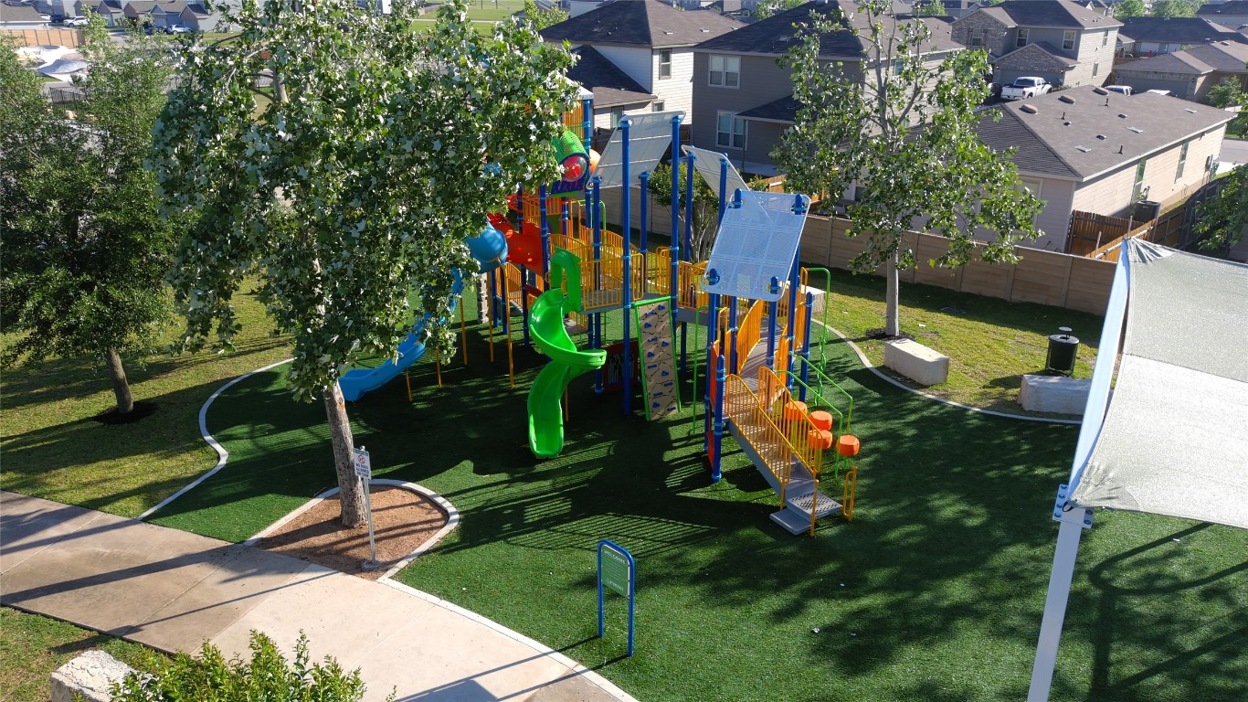 116 Zoisite Lane Jarrell, TX 76537 - Photo 19 of 21 an aerial view of a house with a yard and potted plants
