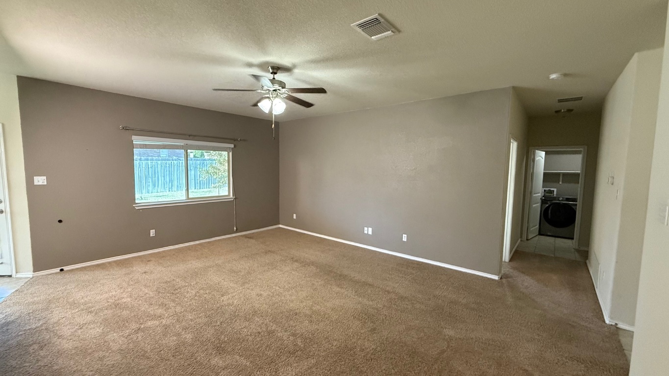 116 Zoisite Lane Jarrell, TX 76537 - Photo 6 of 21 en view of an empty room with a window