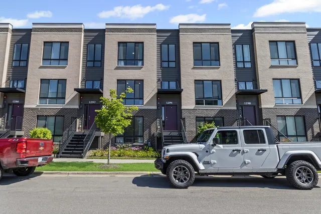 a car parked in front of a house