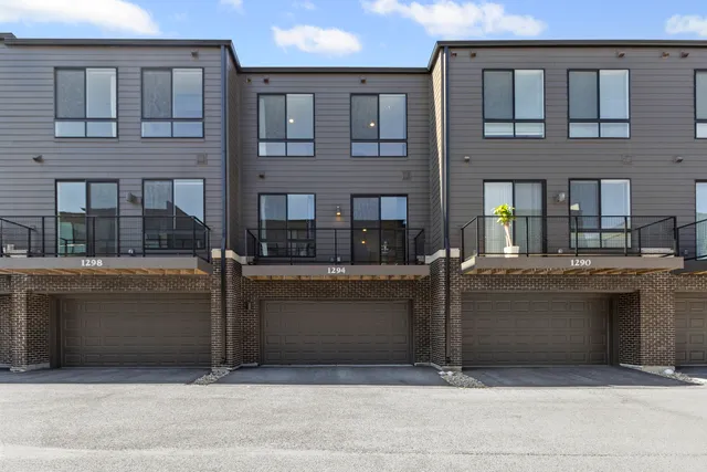 a view of building with large windows