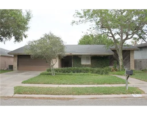 a house view with a garden space
