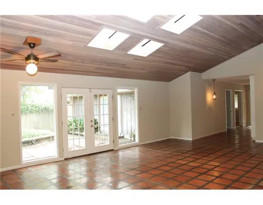 a view of an empty room and window